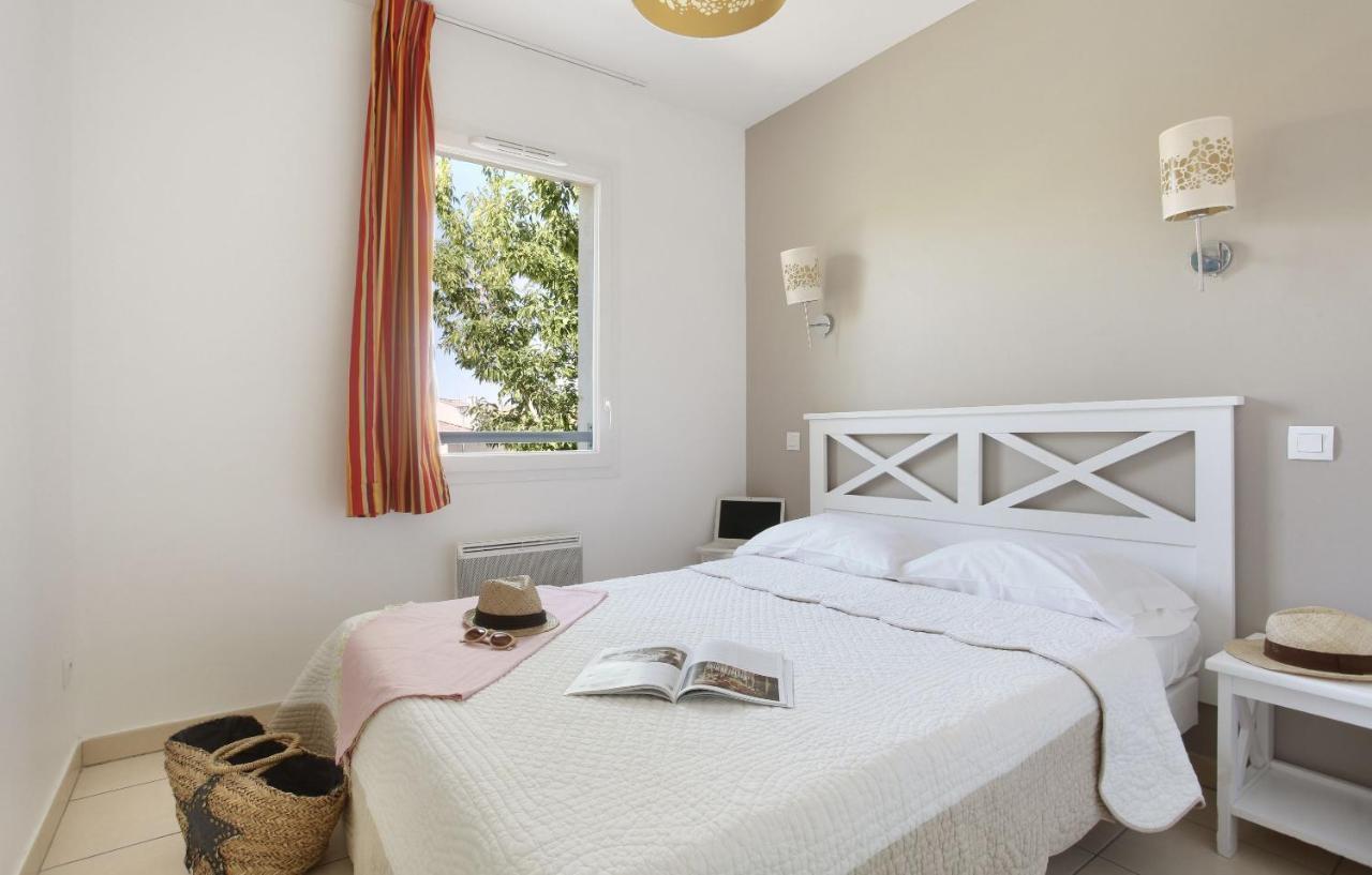 Residence Odalys Le Mas Des Flamants Aigues-Mortes Exterior foto